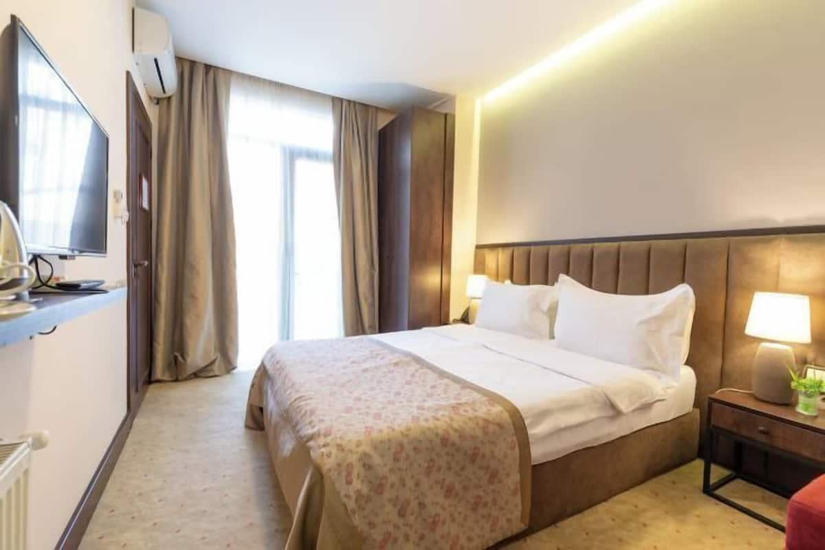 Premium bedding, memory-foam beds, minibar, in-room safe