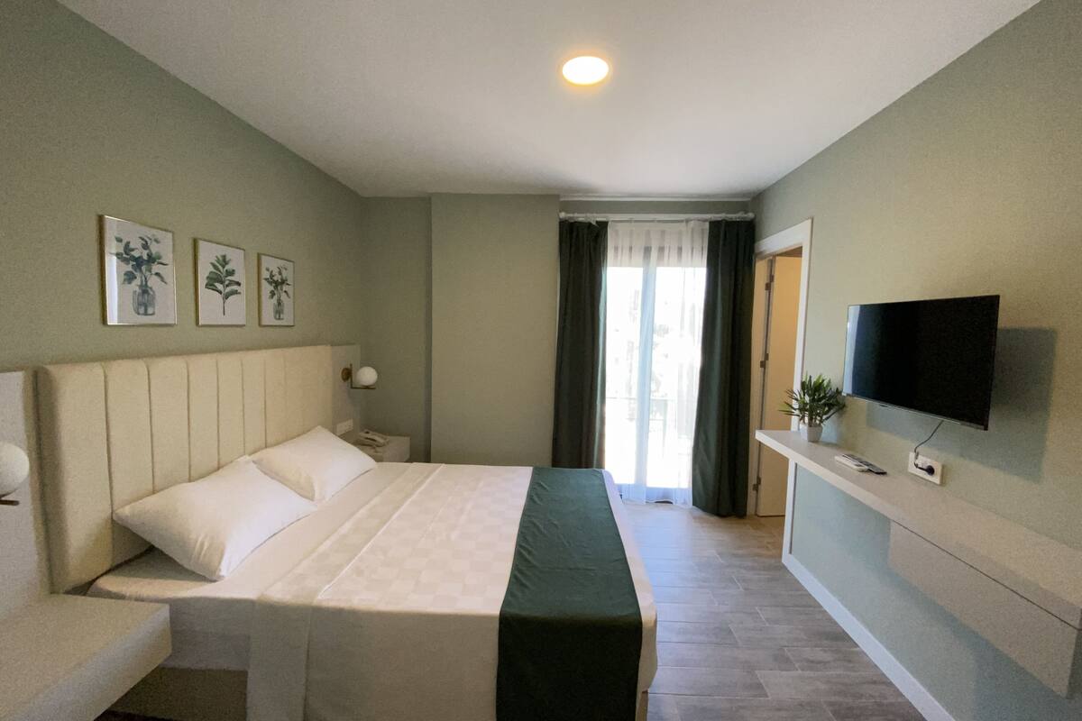 Premium bedding, minibar, desk, laptop workspace