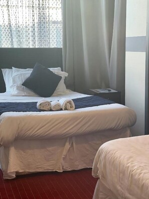 Standard-Dreibettzimmer, Mehrere Betten