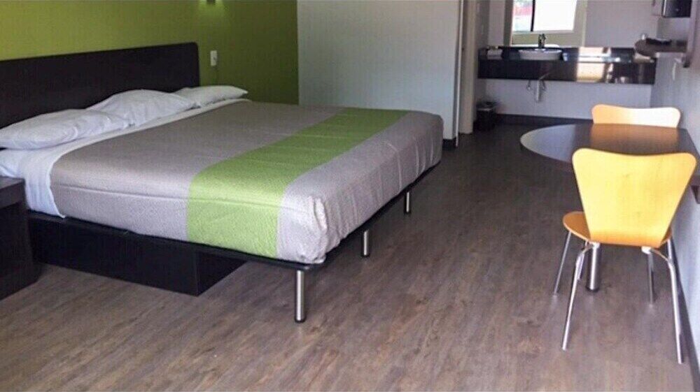 Desk, laptop workspace, free WiFi, bed sheets