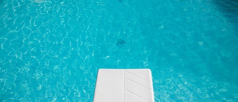 Seasonal outdoor pool, pool umbrellas, sun loungers