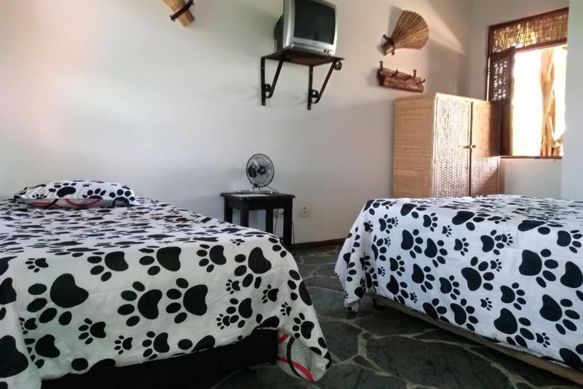 Cortinas blackout, camas plegables/adicionales y wifi gratis