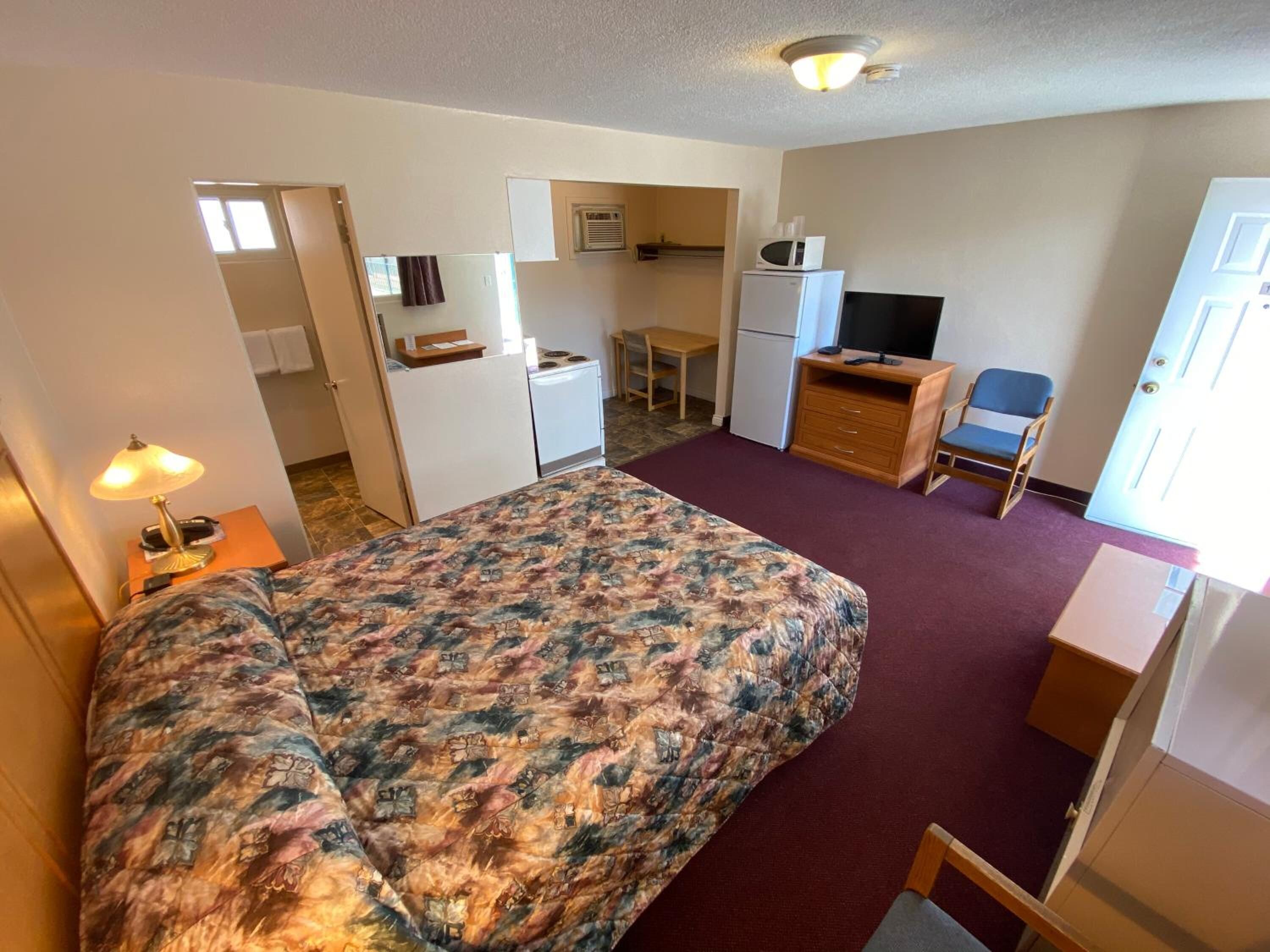 1 bedroom, desk, blackout curtains, iron/ironing board