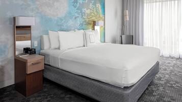 Desk, laptop workspace, iron/ironing board, free cribs/infant beds