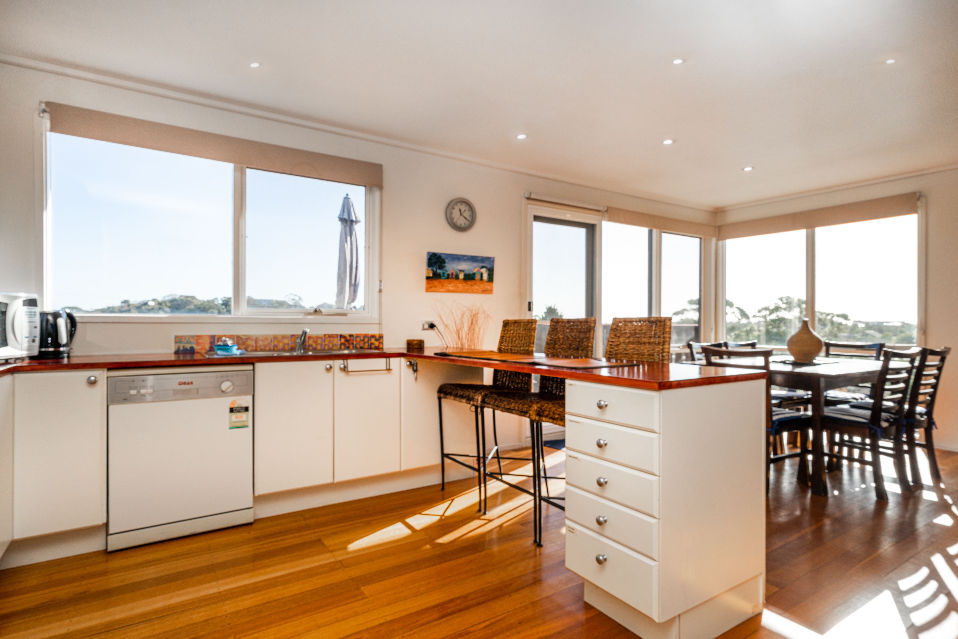 Basic House | Private kitchen | Full-sized fridge, microwave, oven, stovetop