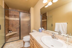 Combined shower/bathtub, hair dryer, towels, soap