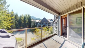 A balcony with a view of a mountain and a building labeled "Aspen's." - Aspens #332 2-Bedroom Ski in Ski out, sleeps 6, Free Wifi (Whistler)