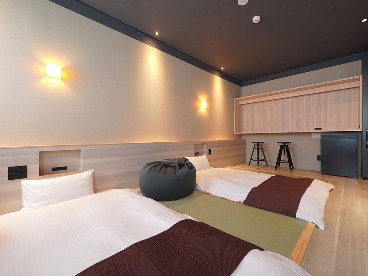 Family Quadruple Room, Non Smoking, Hot Tub | Individually decorated, individually furnished, free WiFi, bed sheets