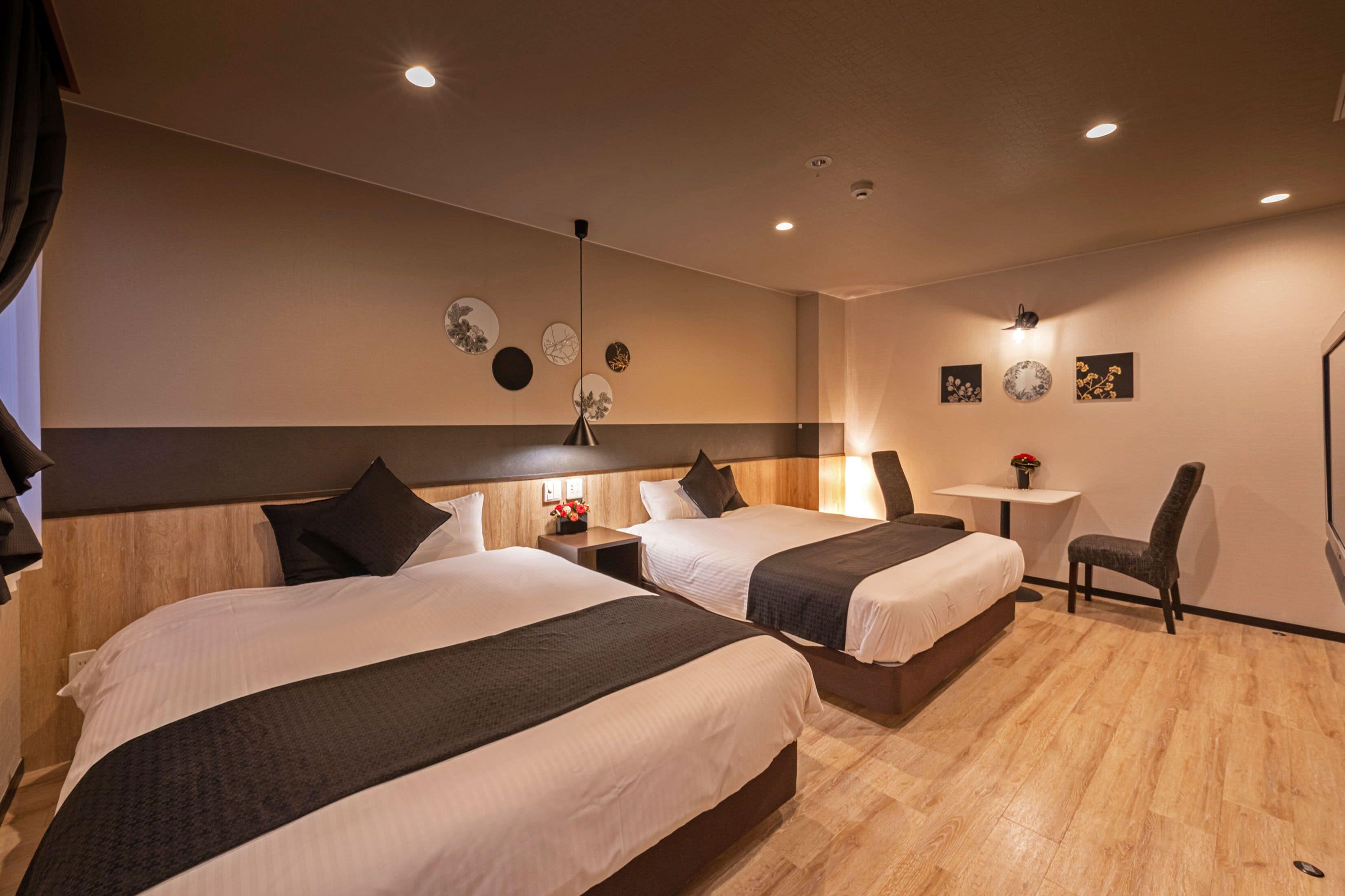 basic twin room, 2 queen beds | individually decorated, individually furnished, free wifi, bed sheets