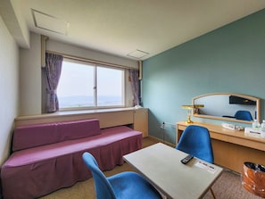 A hotel room with a bed, a desk, a chair, a window with curtains, a mirror, and a view of the outside. - Iwanai Kogen Hotel (Iwanai)