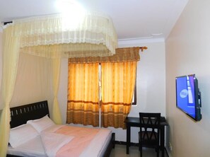 Individually furnished, desk, laptop workspace, blackout drapes