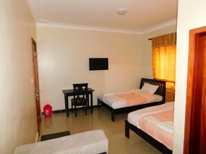 Deluxe Twin Room | Individually furnished, desk, laptop workspace, blackout curtains - Range Lands Hotel (Kaabong)