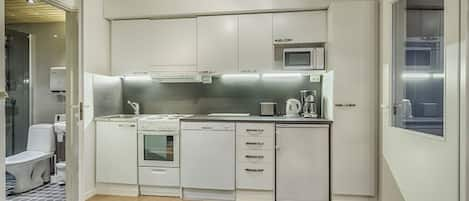 Apartment, 2 Twin Beds, Sauna | Private kitchen | Coffee/tea maker, electric kettle, cookware/dishes/utensils