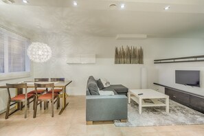 Apartment, 2 Einzelbetten, Sauna | Wohnbereich