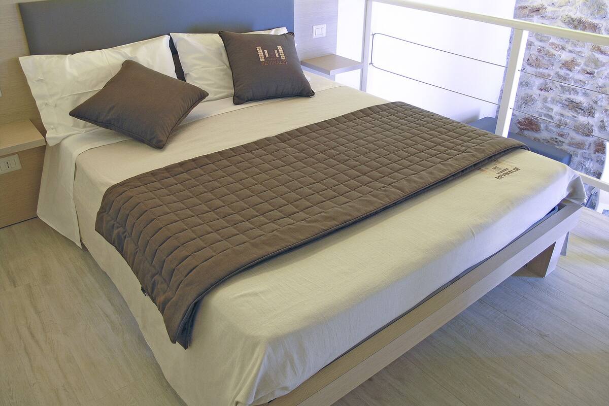 Suite familiar | Minibar, escritorio, cunas y ropa de cama