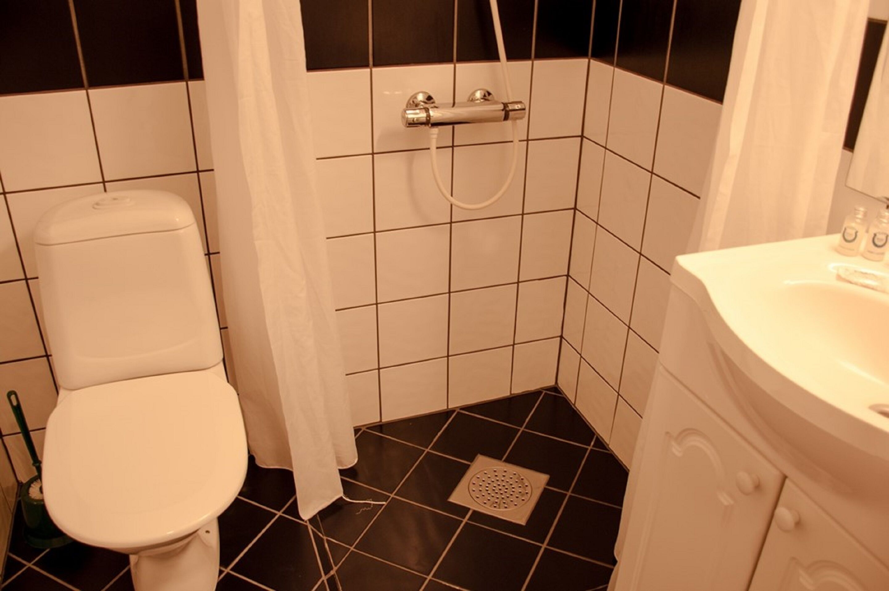 double room | bathroom | shower, hair dryer, soap, shampoo