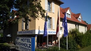 A hotel named 'Hotel Buchholz' with a sign indicating a buffet. - Hotel Buchholz (Berlin)