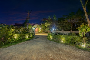 Surrounded by lush greenery, this secluded house offers a peaceful retreat.