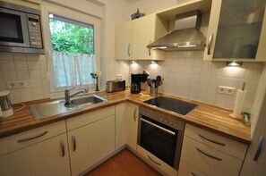 Refrigerador, microondas, horno y lavavajillas 