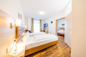 コンフォート ダブルルーム | 1 室のベッドルーム、デスク、ノートパソコン用作業スペース、可動式ベッド