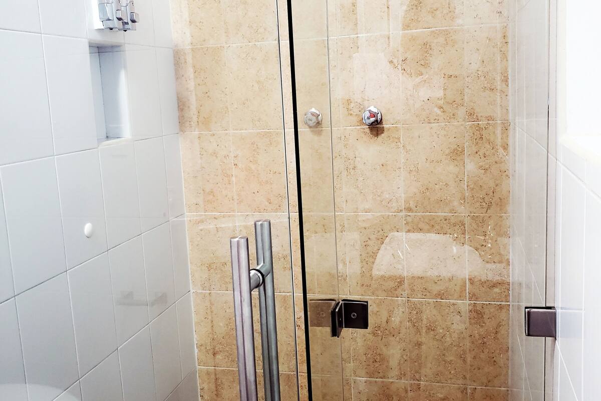 shower, free toiletries, towels, soap