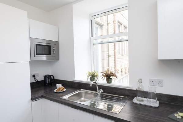 Appartamento, 3 camere da letto (1) | Cucina privata | Frigorifero, microonde, forno, piano cottura