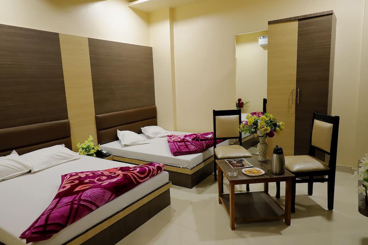 Royal Quadruple Room | 1 bedroom, desk, laptop workspace, blackout drapes