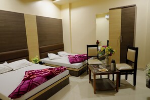 Royal Quadruple Room | 1 bedroom, desk, laptop workspace, blackout drapes