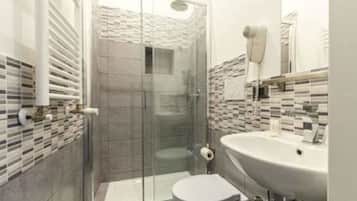 Basic Double Room | Bathroom | Shower, rainfall showerhead, free toiletries, hair dryer