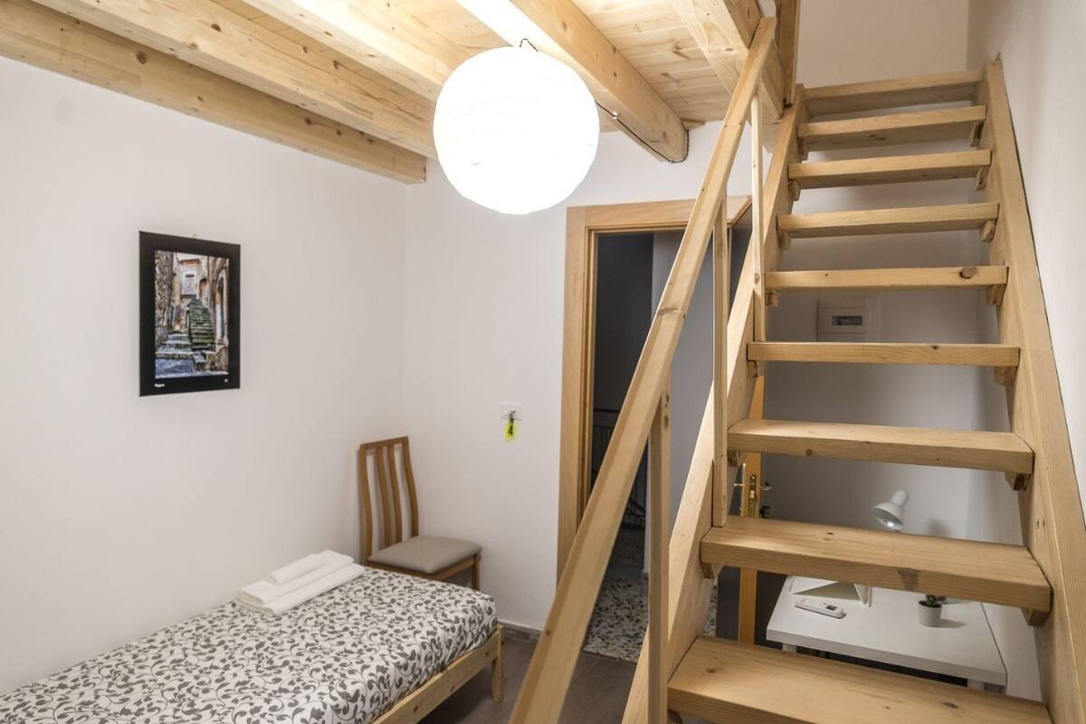 Executive Triple Room (n. 4) | Premium bedding, minibar, soundproofing, iron/ironing board