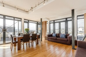 Penthouse Apartment (Penthouse 3) | Living area | 42-inch flat-screen TV with digital channels, TV, DVD player - Riviera Apartments (Teignmouth)