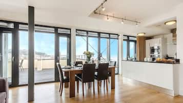 Penthouse Apartment (Penthouse 4) | Living area | 42-inch flat-screen TV with digital channels, TV, DVD player