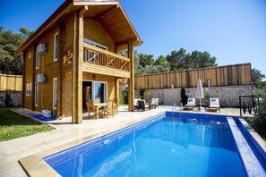 Outdoor pool, pool umbrellas, pool loungers