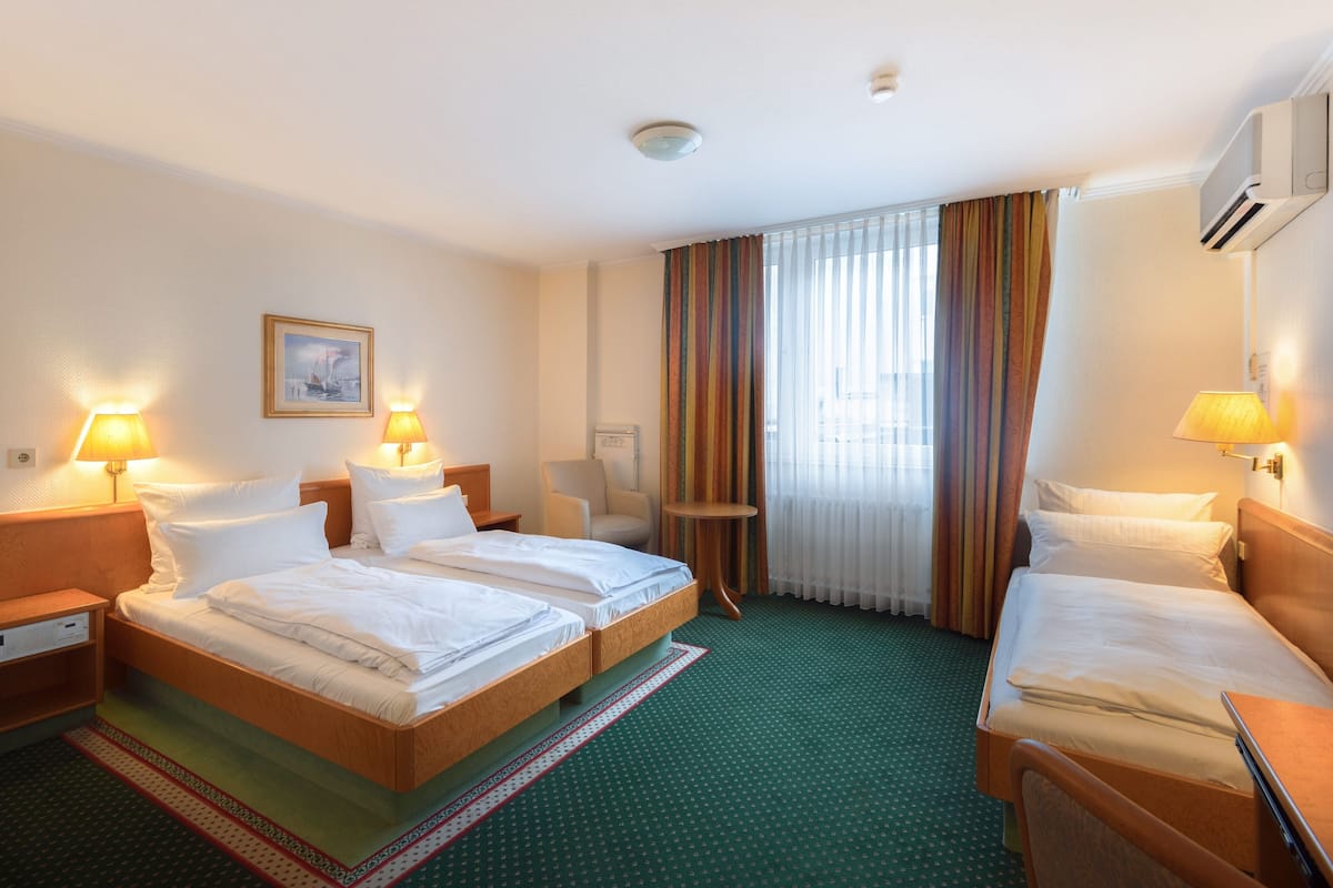 Triple Room (Classic Trio) | 1 bedroom, desk, laptop workspace, blackout drapes