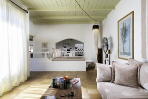 Villa Deluxe | Area soggiorno | TV a schermo piatto, caminetto