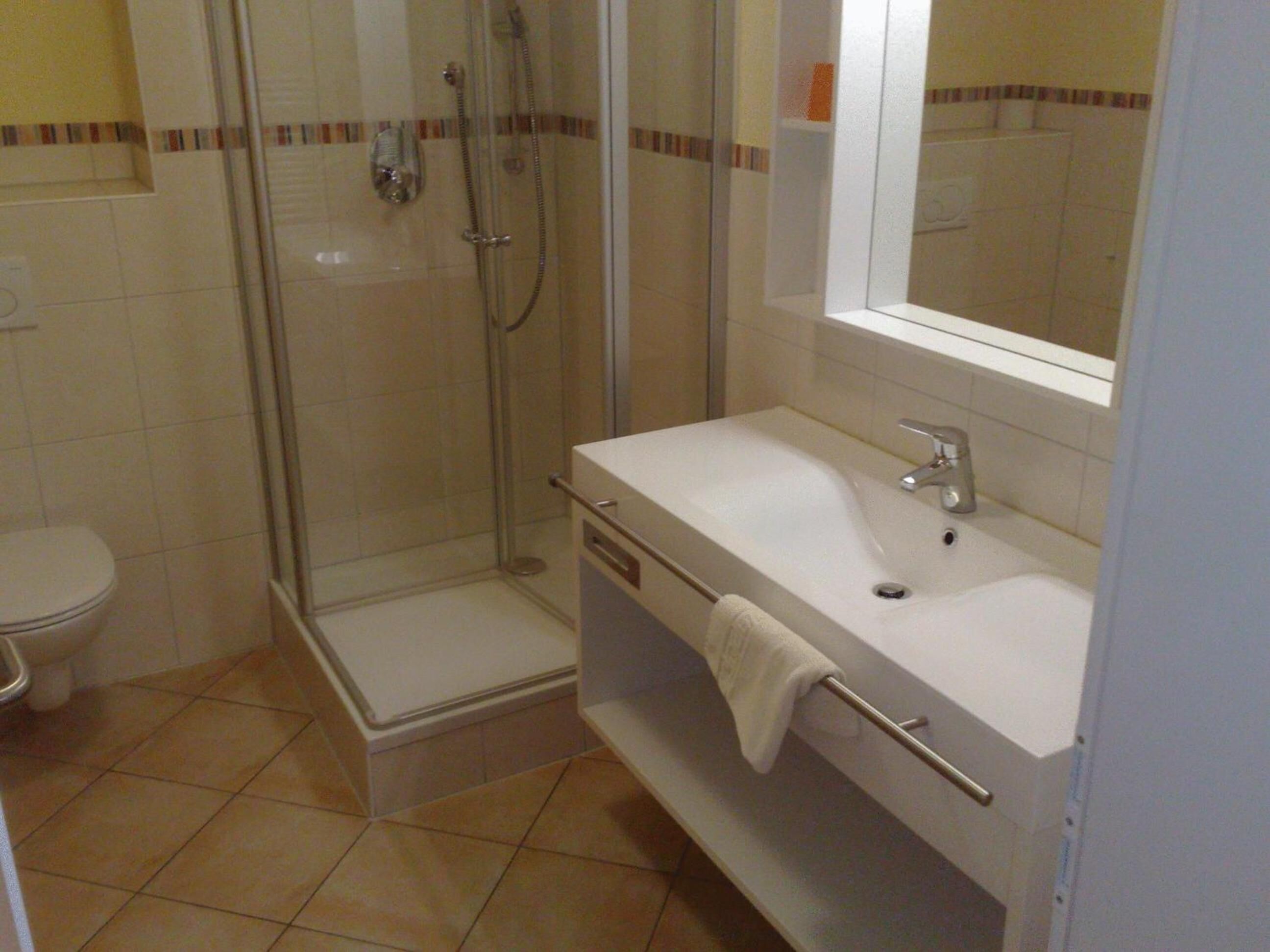 shower, bathrobes, towels