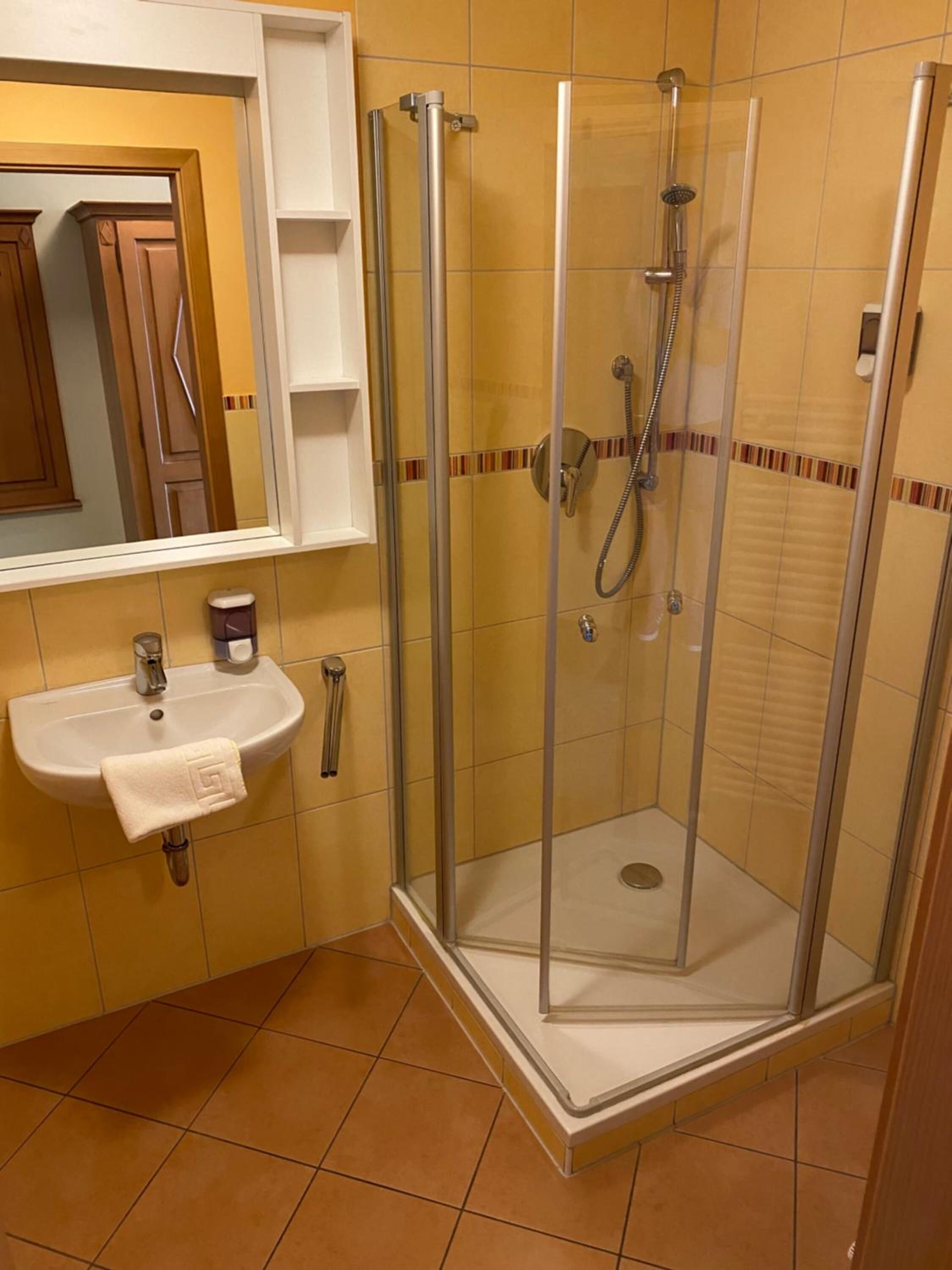 shower, bathrobes, towels