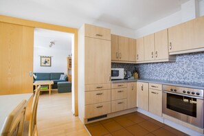 Panoramic House, 2 Bedrooms, Terrace, Mountain View | Private kitchen | Fridge, oven, stovetop, dishwasher - Haus Wailand by Alpin Bookings (Dienten am Hochkoenig)