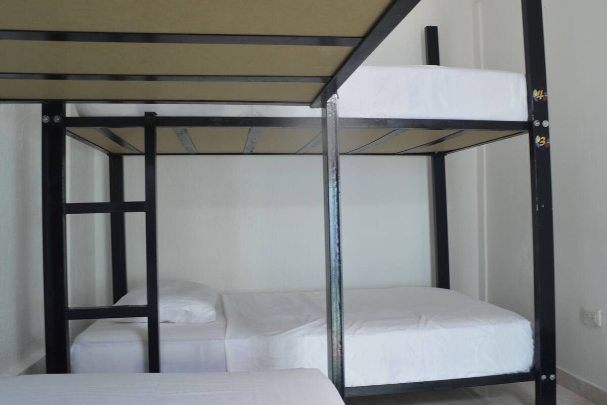 Blackout curtains, iron/ironing board, free WiFi, bed sheets