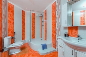 Shower, free toiletries, hair dryer, slippers