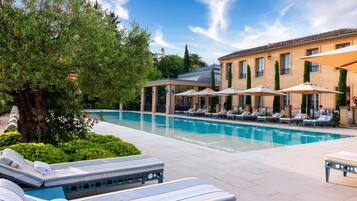Outdoor pool, open 7:00 AM to 8:00 PM, free cabanas, pool umbrellas