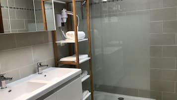 Shower, free toiletries, hair dryer, towels