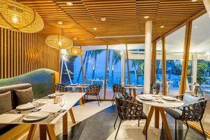 Breakfast, lunch served; local and international cuisine, beach views 