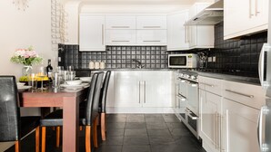 Apartment, 1 Schlafzimmer | Eigene Küche | Kühlschrank, Mikrowelle, Ofen, Herdplatte