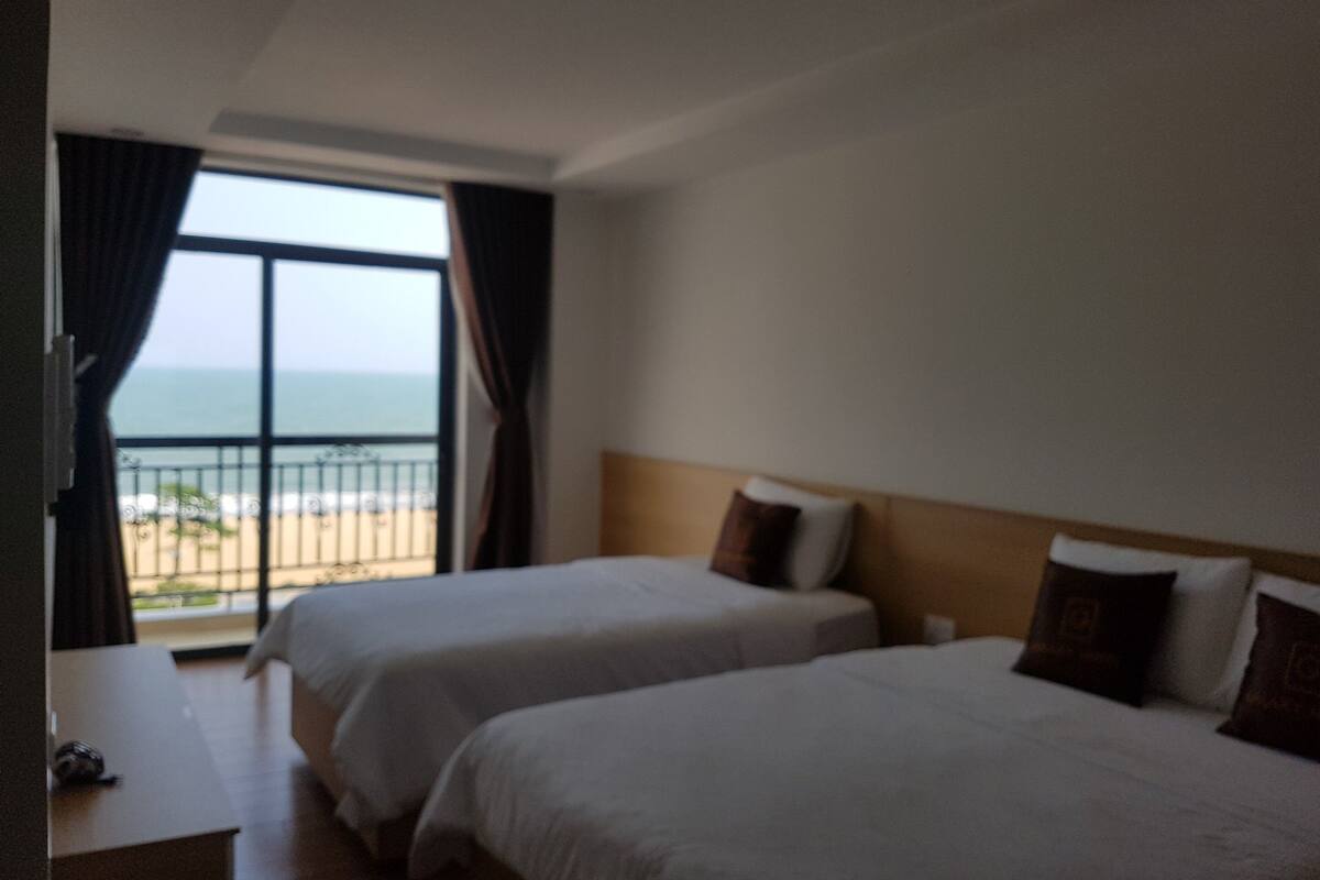 Deluxe Triple Room, Sea View | 1 bedroom, premium bedding, pillowtop beds, minibar