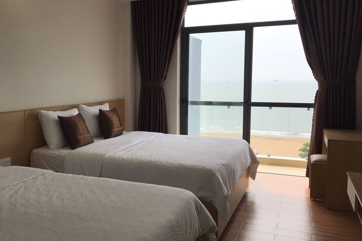 Deluxe Quadruple Room, Sea View | 1 bedroom, premium bedding, pillowtop beds, minibar