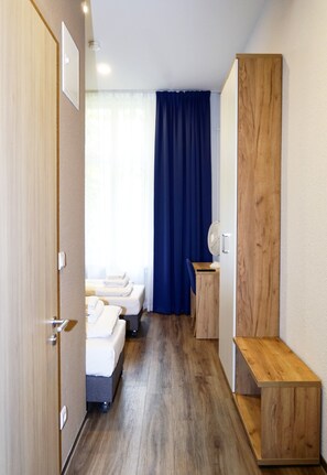 Twin Room | Desk, iron/ironing board, free WiFi, bed sheets