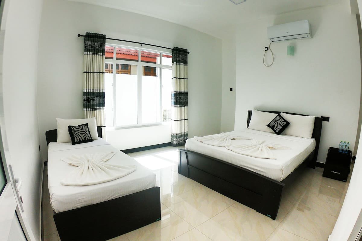 Habitación triple Deluxe | Wifi gratis