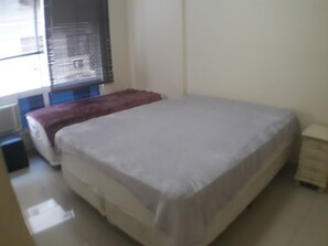 Apartamento (2 Bedrooms) | 2 quartos, Wi-Fi de cortesia, roupa de cama