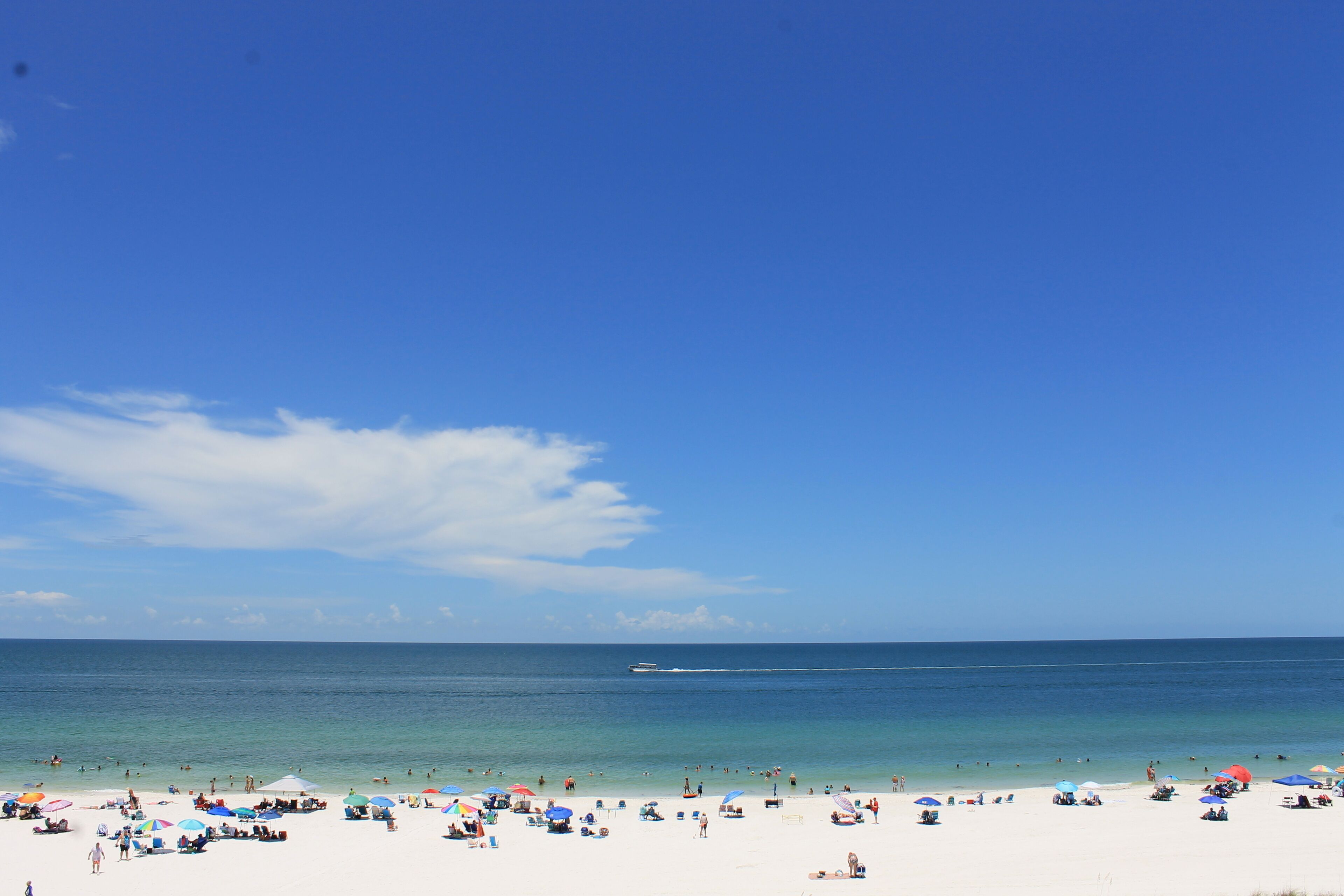 On the beach, sun-loungers, beach towels